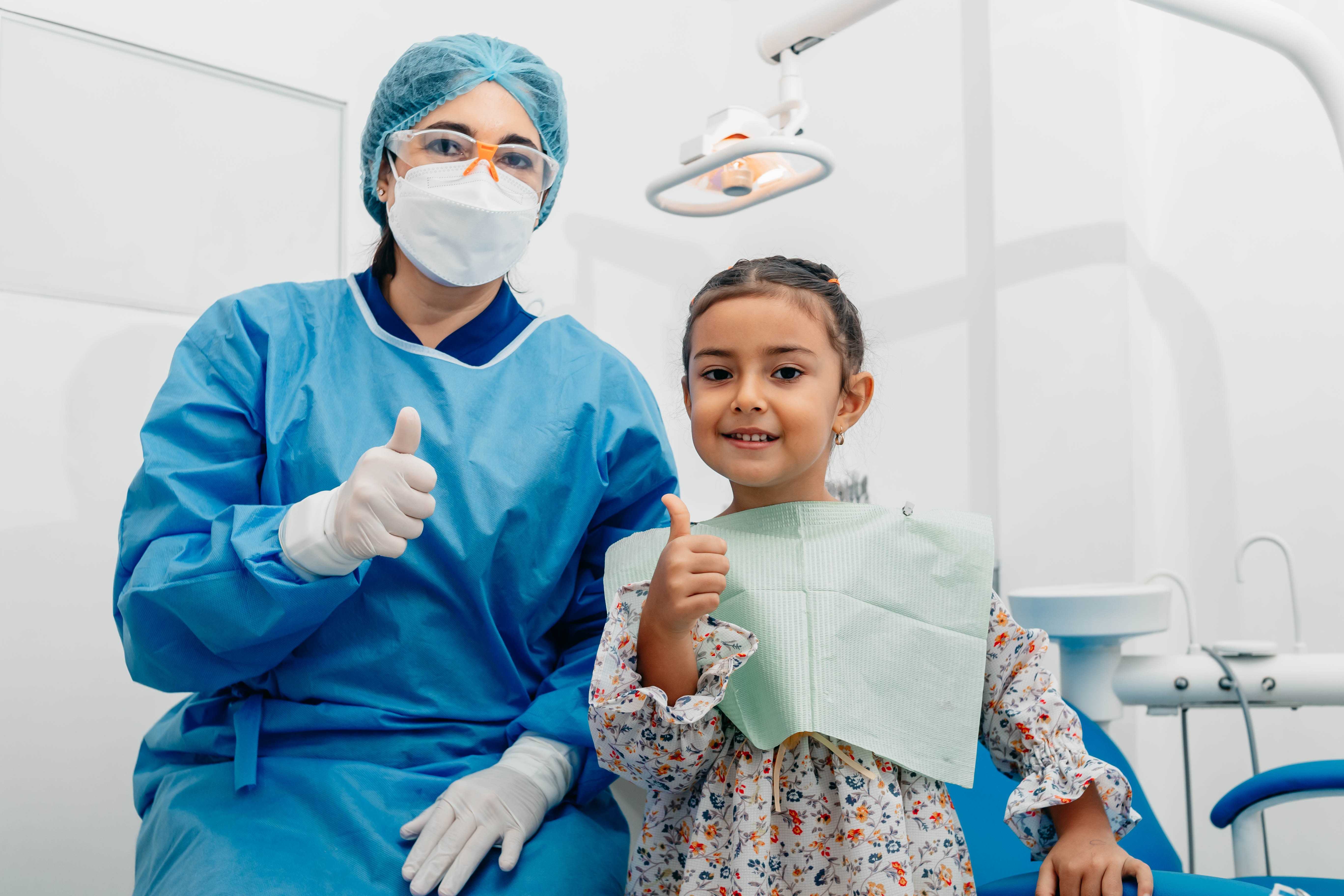 dr olivia with a smiling child patient
